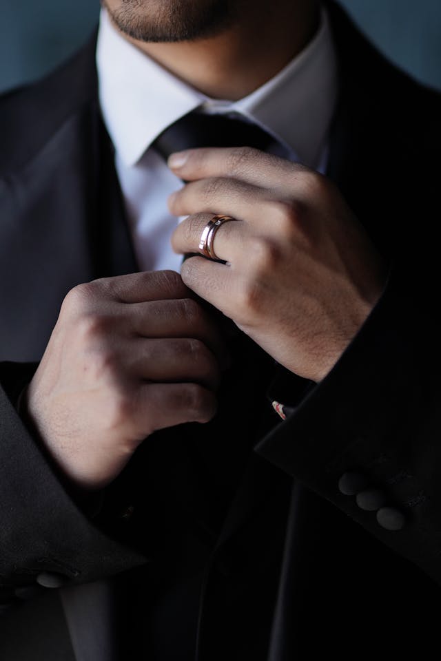 man wearing engagement ring