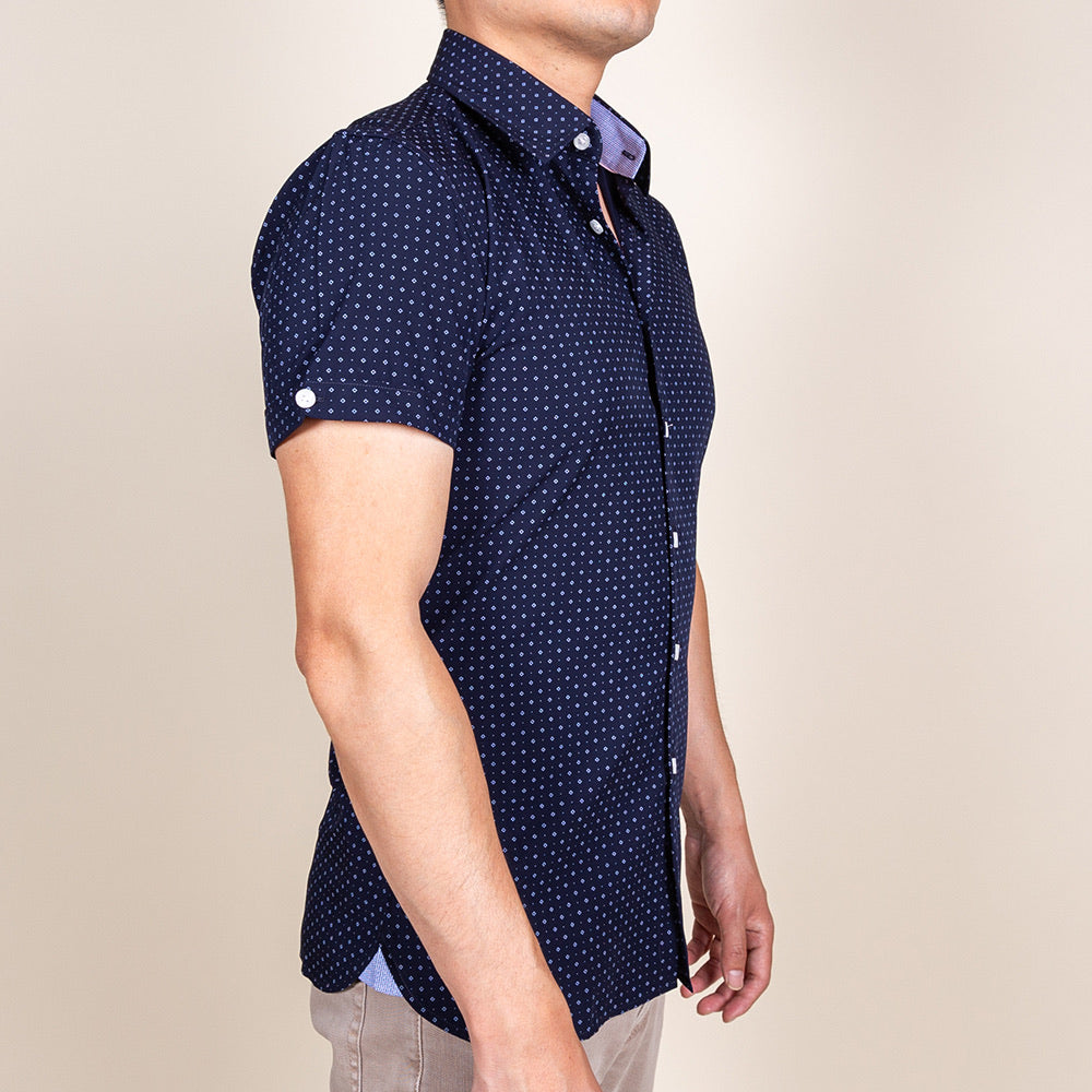 Model 5'5”, 120 lb wearing Size N2 — blue bamboo fiber slim fit navy blue collared button up shirt short sleeve