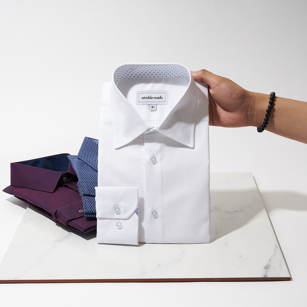 white collared shirt for men folded up for travel | Slim Fit White Collared Speckled Dress Shirt | Long Sleeve Button Up