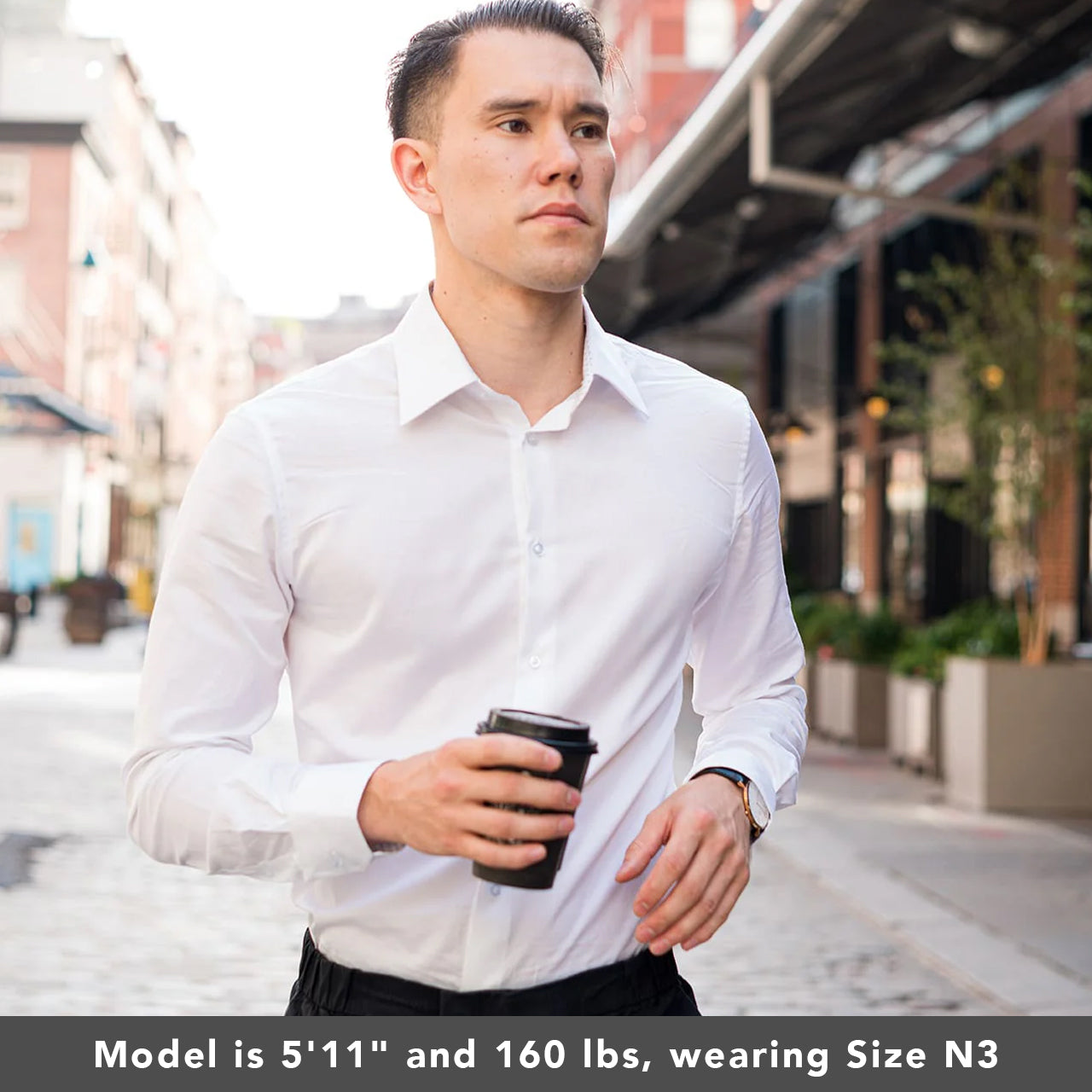 man with coffee in city wearing white button up collared dress shirt for men | Slim Fit White Collared Speckled Dress Shirt | Long Sleeve Button Up