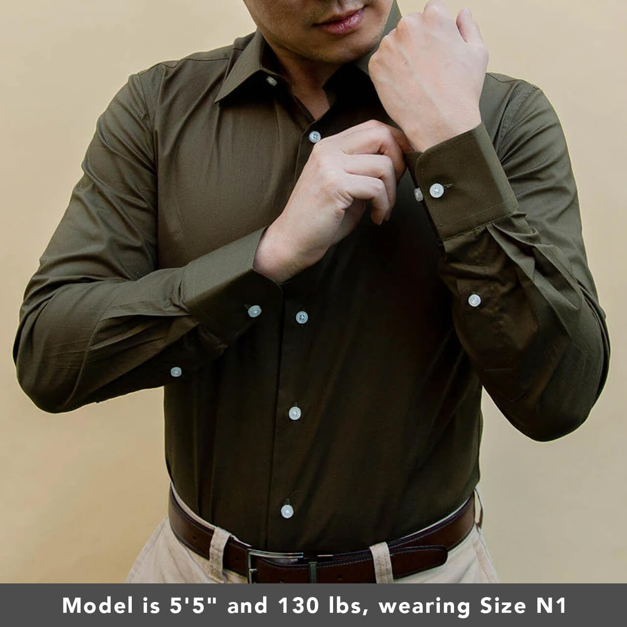 model is 5'5" and 120 lbs wearing size N1 of olive 100% cotton shirt