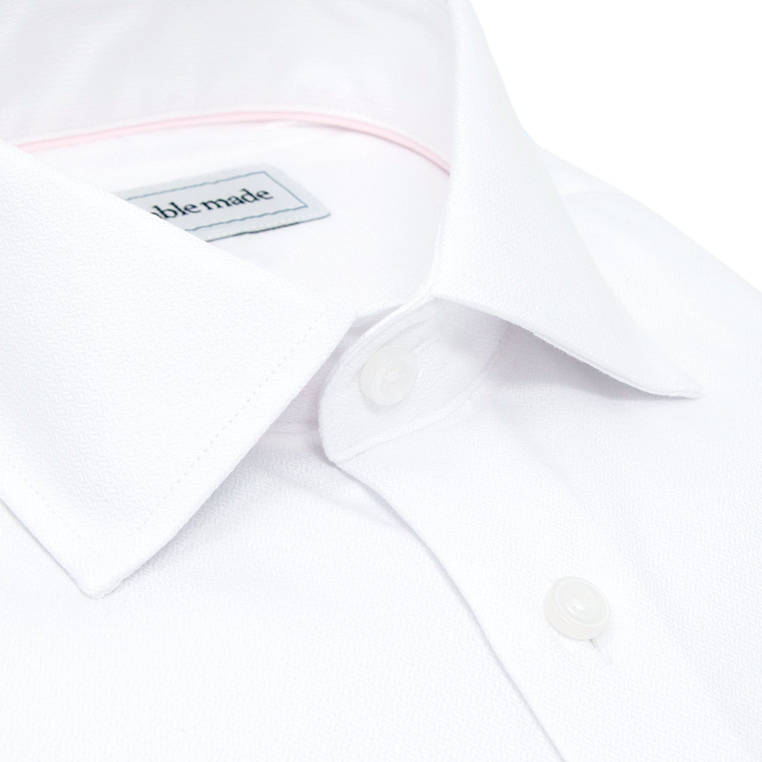 closeup of white dress shirt fabric and semi-spread collar Slim Fit White Collared Dress Shirt | Shop The Bai Men's Long Sleeve