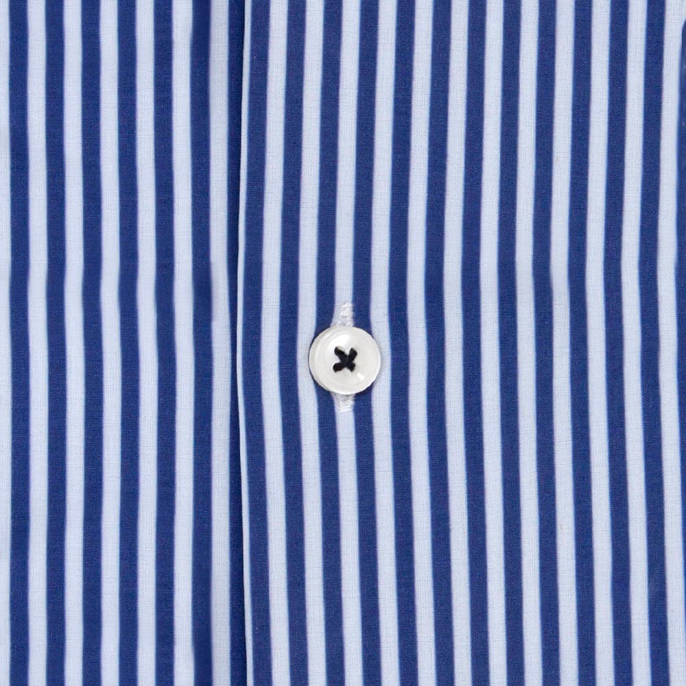 close up of blue and white striped dress shirt button and fabric