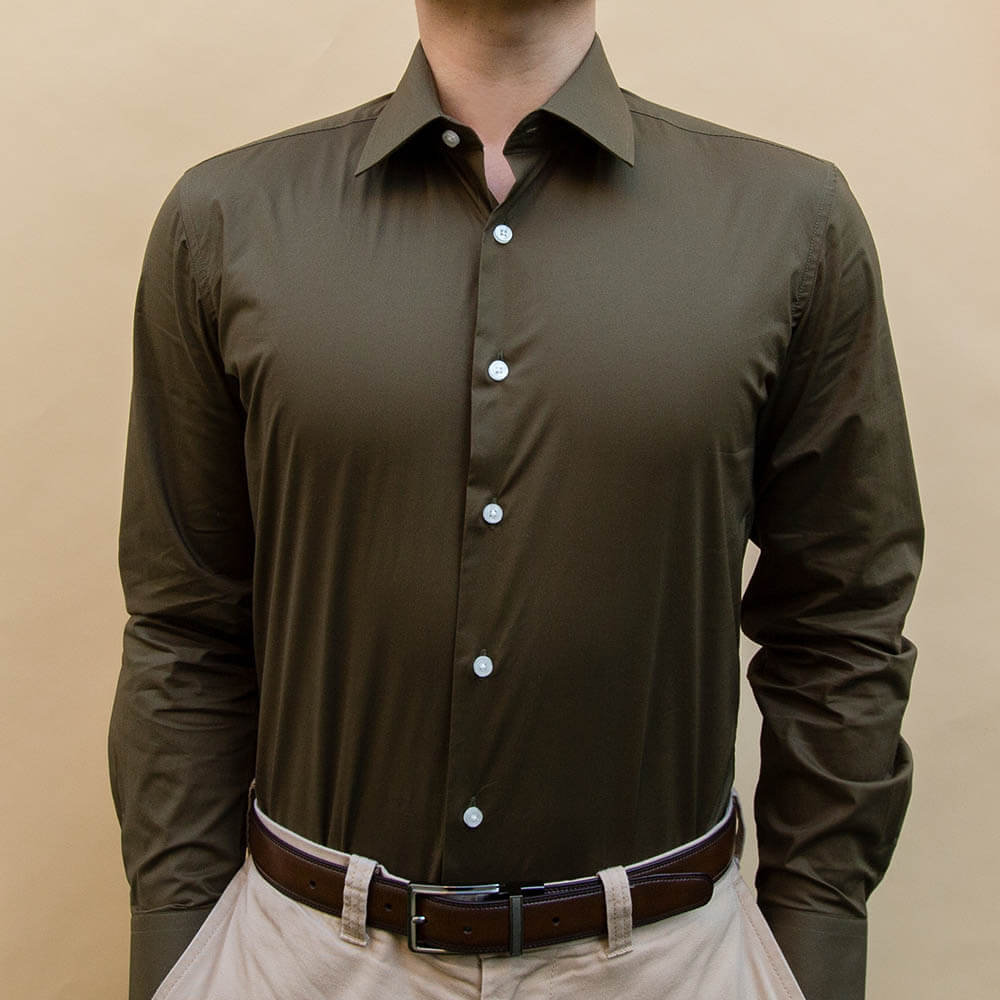 model is 5'5" and 120 lbs wearing size N1 of olive 100% cotton shirt