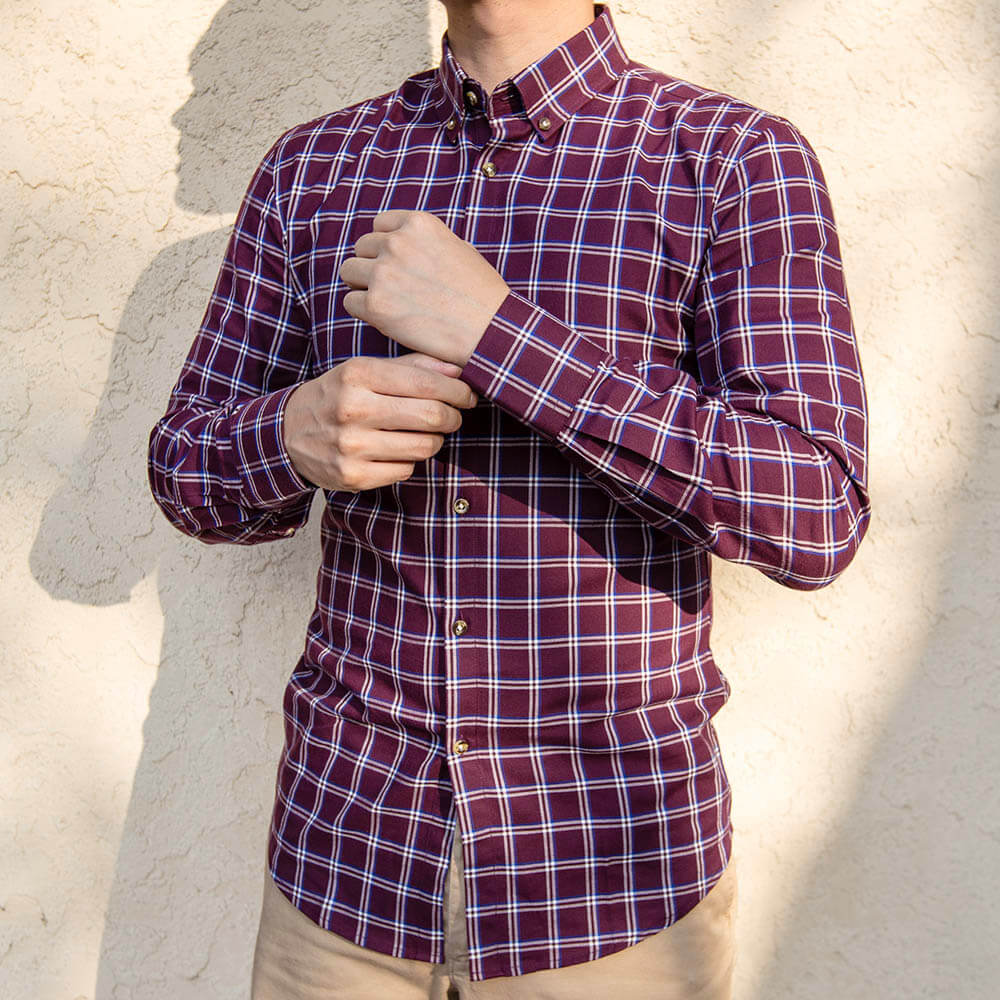 model is 5'5" and 120 lbs wearing the size N1 in red and blue navy checked plaid shirt