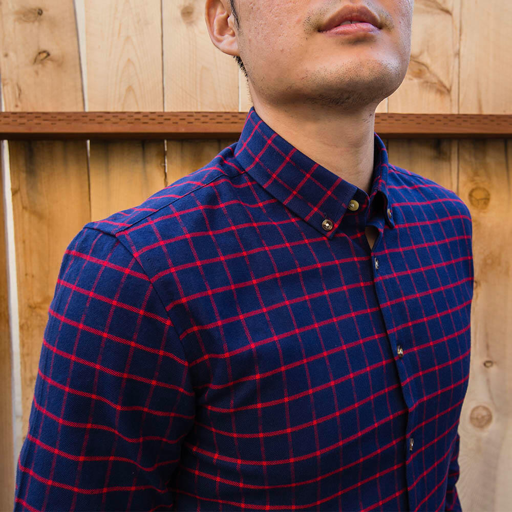 dark blue button down shirt closeup of upper torso on man