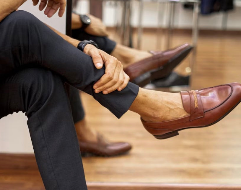black suit brown shoes
