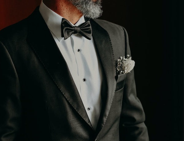 black satin lapel on a tuxedo jacket with bow tie