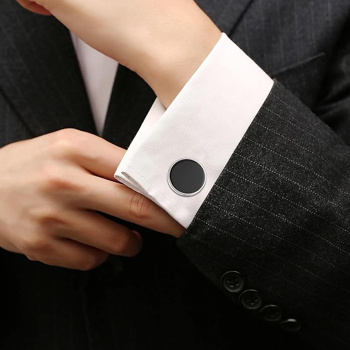 Men's white cufflinks with black suit