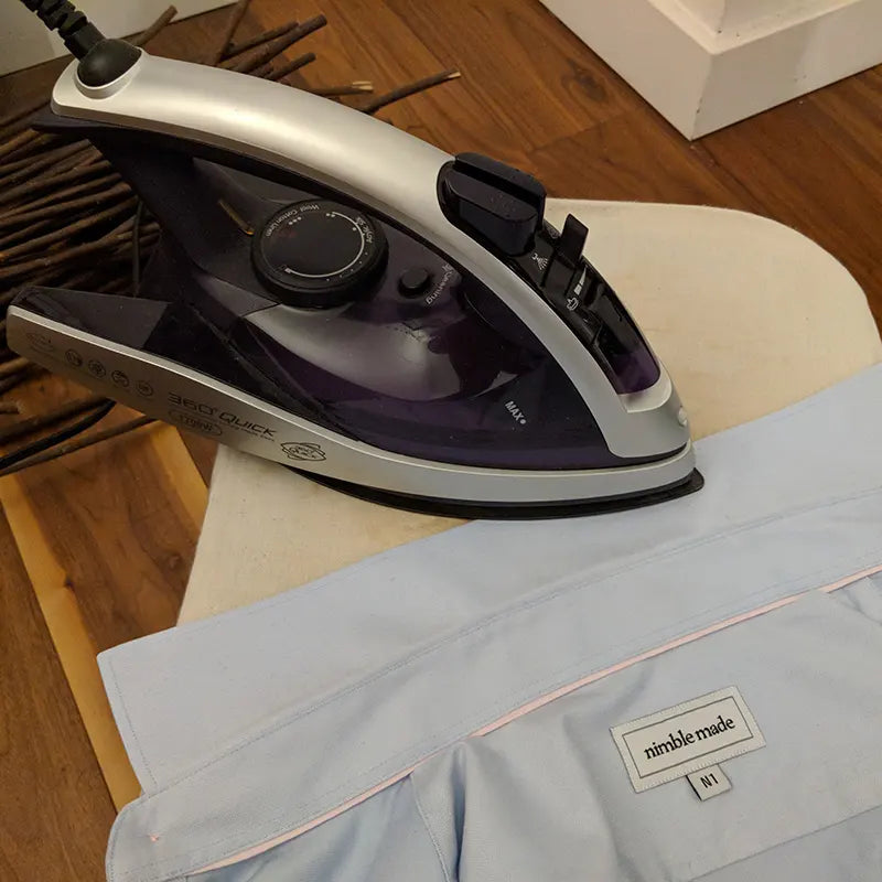how to Iron a dress shirt with shirt collar on an ironing board