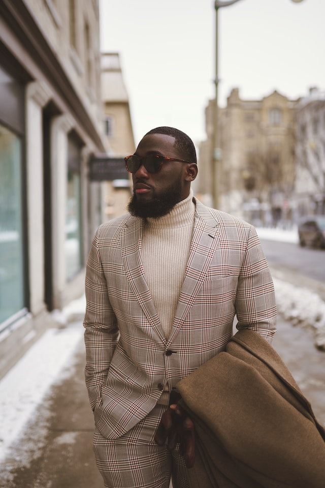 Tan turtleneck with suit