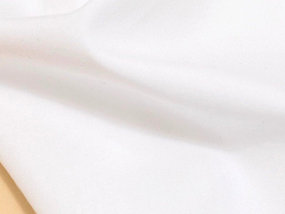 white poplin weave fabric on men's dress shirt