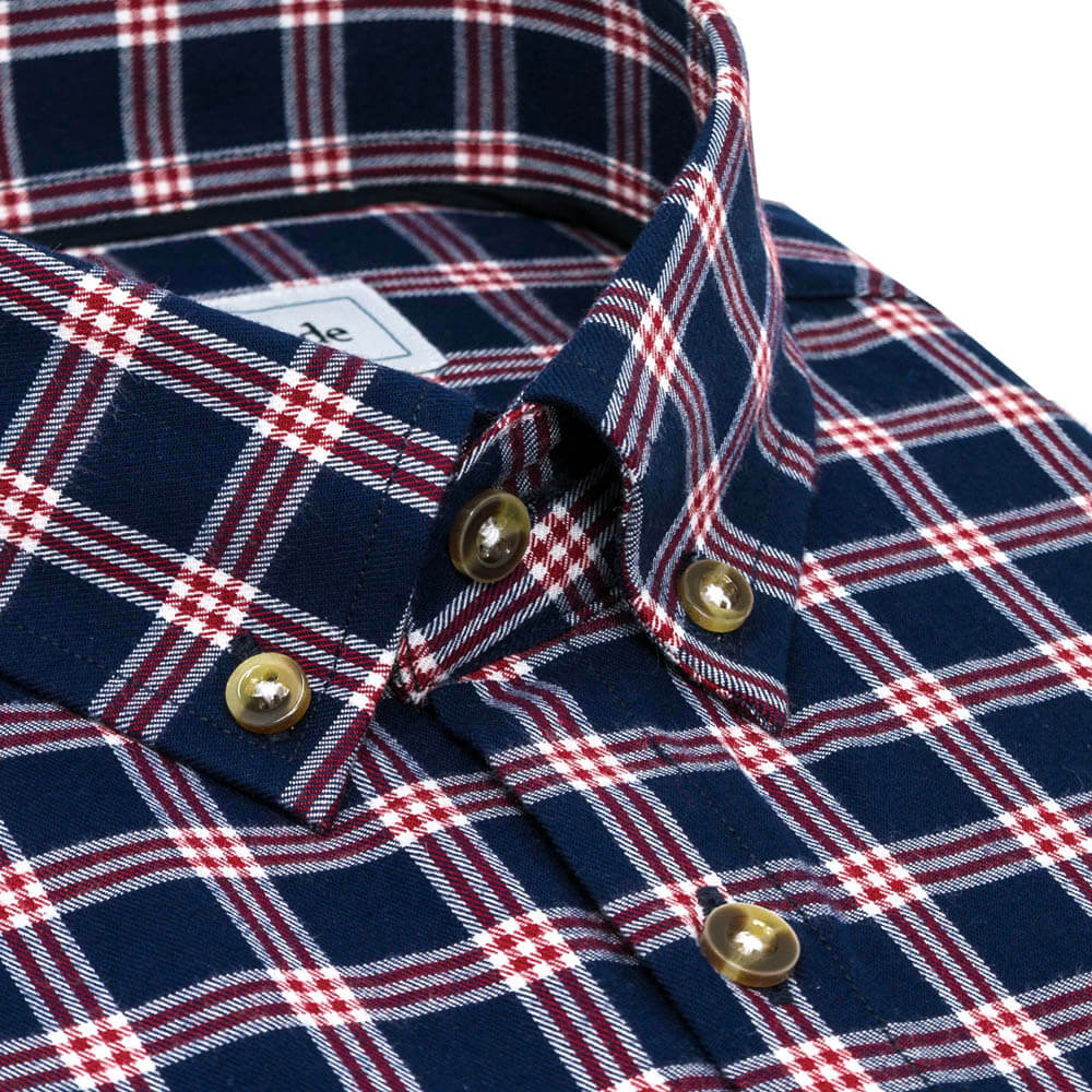 navy blue and red flannel closeup of button down collar