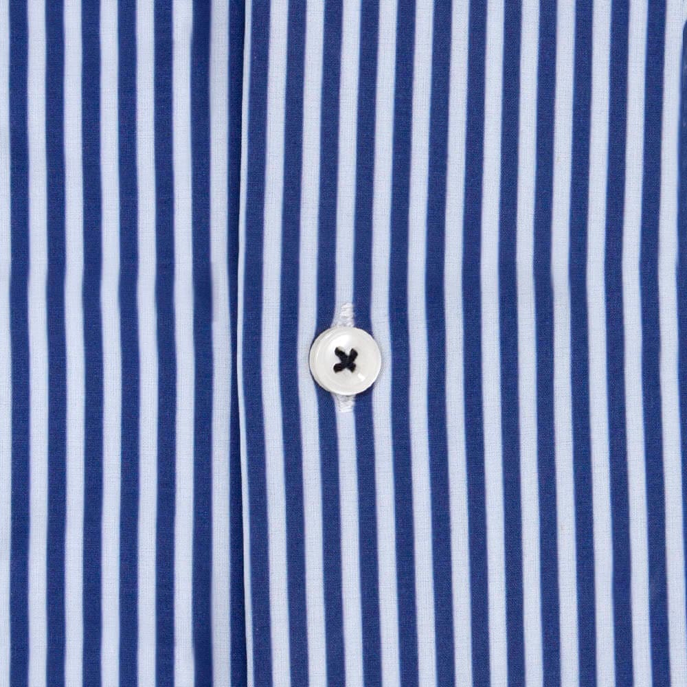 close up of blue and white striped dress shirt button and fabric