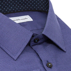 close up of cobalt blue mens dress shirt showing collar and buttons