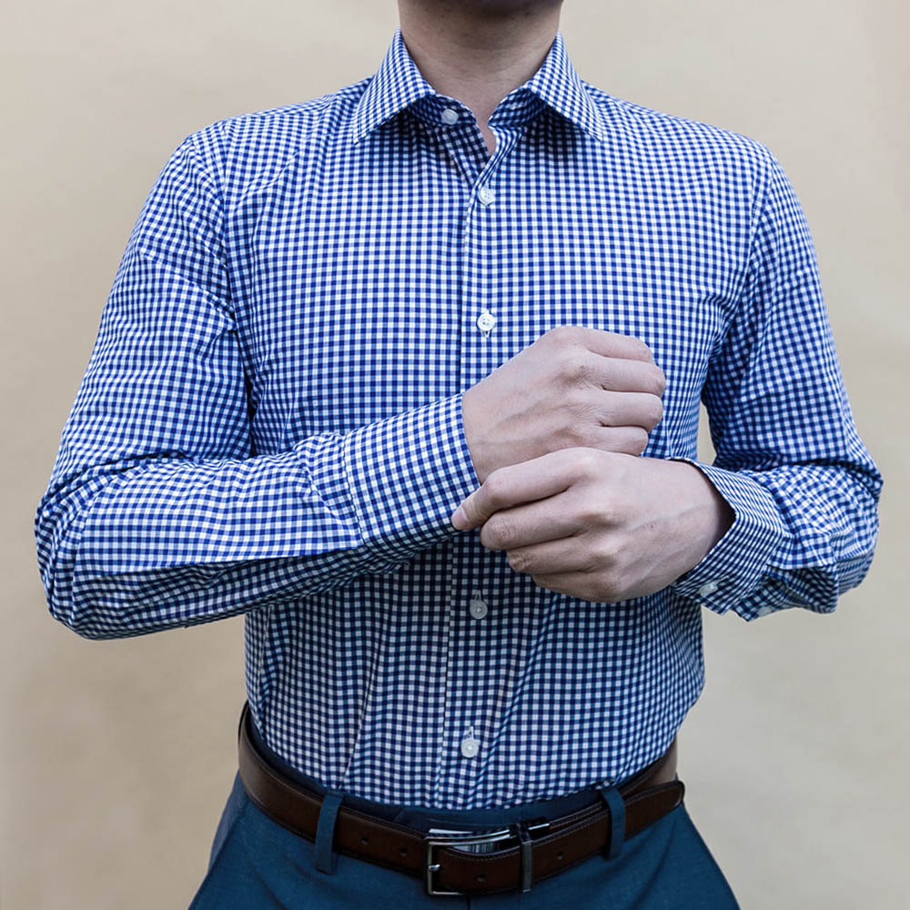 man wearing checkered dress shirt