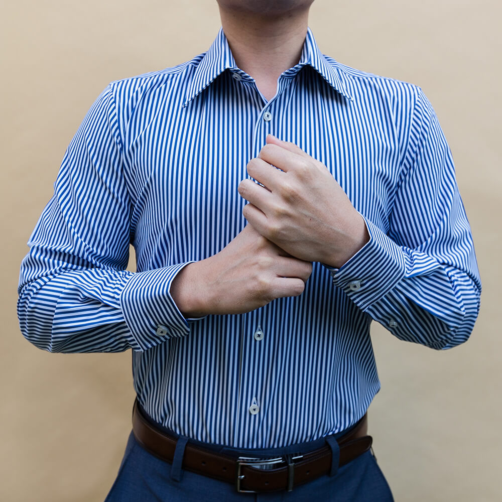 non iron white striped dress shirt on a man