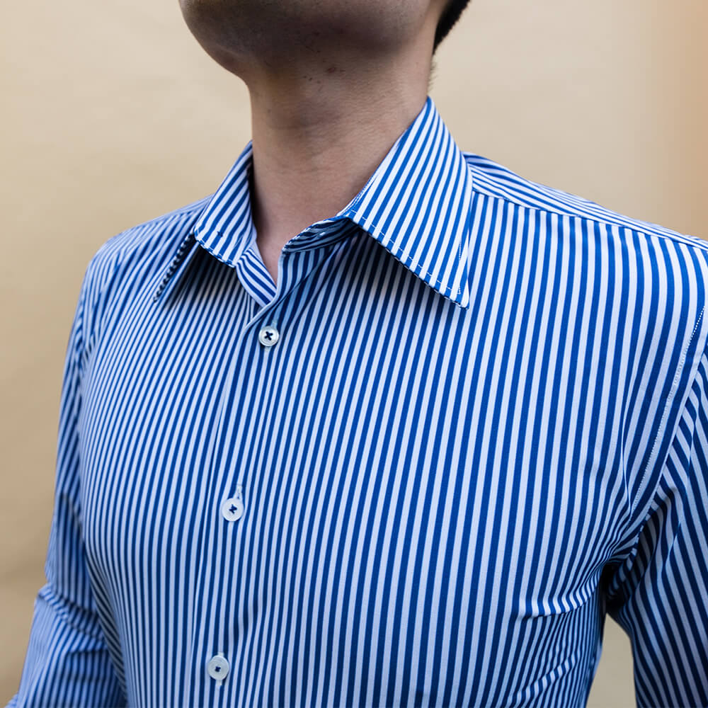 blue and white dress shirt closeup on collar and buttons