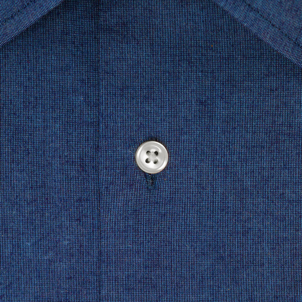 closeup of mens shirting fabric on a heather blue shirt