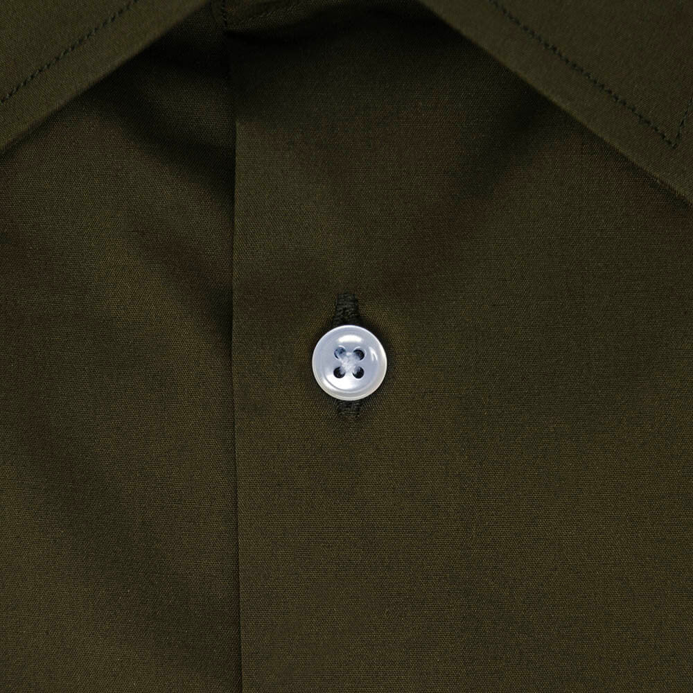 closeup of button on army green dress shirt
