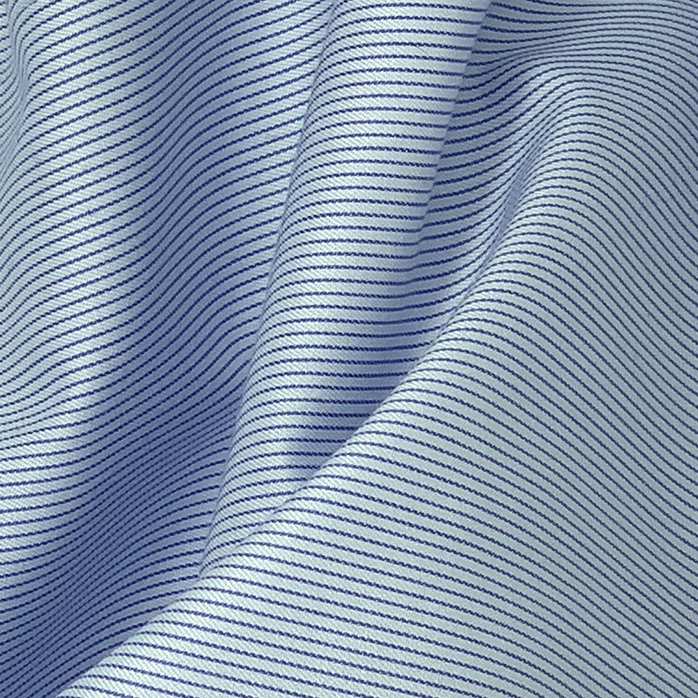 closeup of blue pinstripe dress shirt fabric in 100% cotton