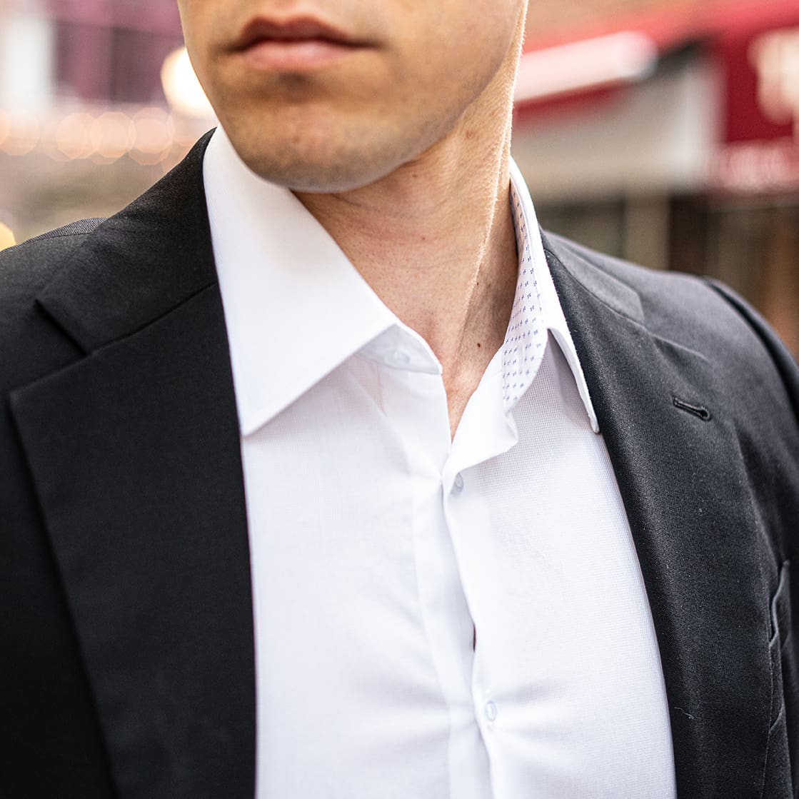 white collared shirt with black suit jacket